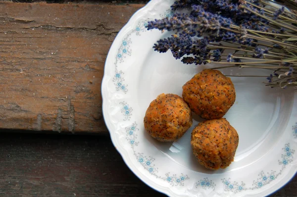 Carrot truffles with lavender on a plate — Stock Photo, Image