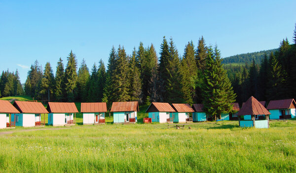 wooden huts in the mountains