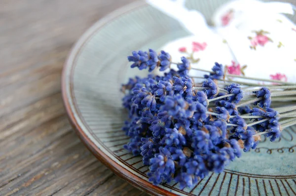 Lavender flower and lavender bag on table — Stok fotoğraf