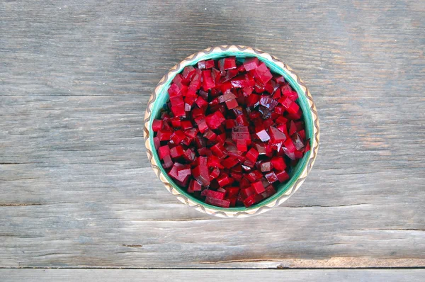 Fresh beetroot salad in ceramic bowl on rustic wooden table — Stock Photo, Image