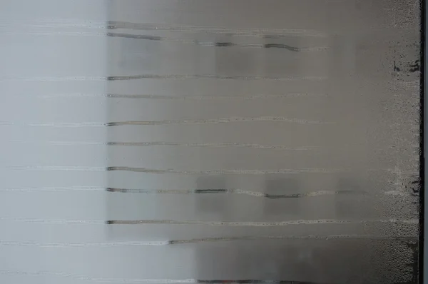 Gocce d'acqua sulla finestra al vapore — Foto Stock