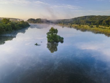 Morning fog on the river. Tranquil landscape on Southern Bug, Ukraine