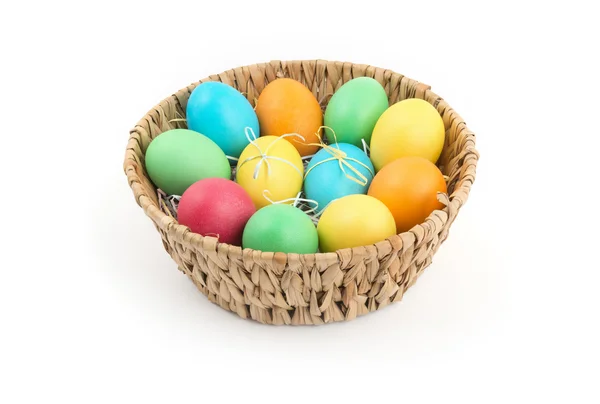 Basket with colorful Easter eggs — Stock Photo, Image