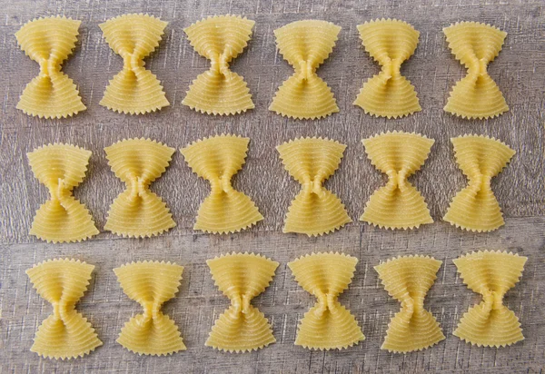 Farfallette pasta background — Stock Photo, Image