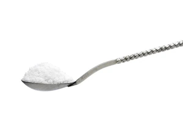 Old spoon with salt Royalty Free Stock Photos