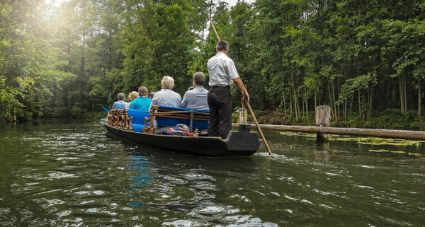 with the boat and canoe traveling in Spreewald in Germany