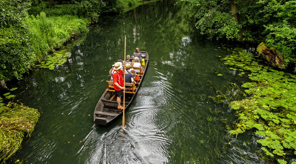 with the boat and canoe traveling in Spreewald in Germany