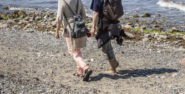 Walk on pebble beach — Stock Photo, Image