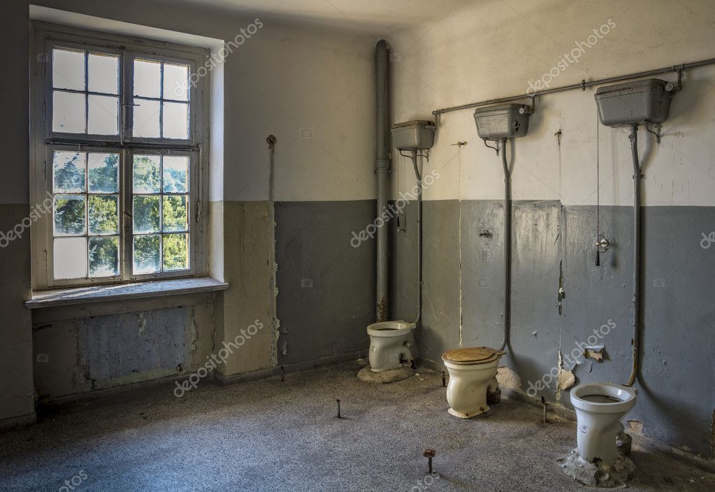 Military Men Using Communal Toilets