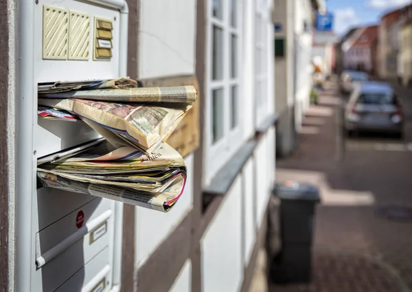 A mailbox with advertising and newspapers — Stock Photo, Image