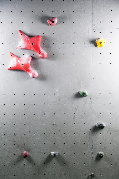 Artificial climbing wall with a variety of holds — Stock Photo, Image