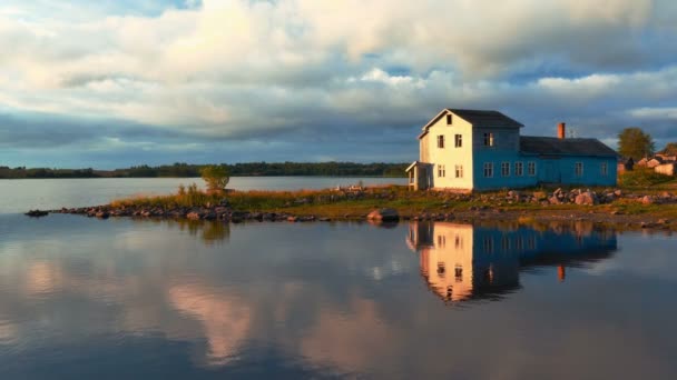 Lonely house on a lake shore — Stock Video