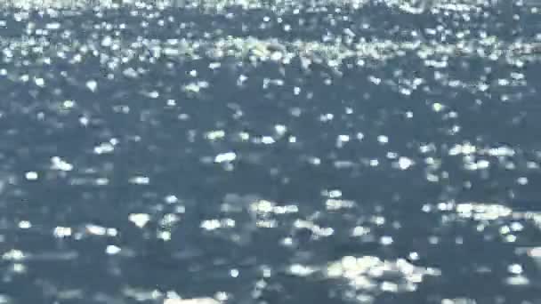 Sun Reflecting in Blue Water, Defocused — Stock Video