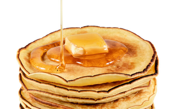 Pancakes with butter and syrup.