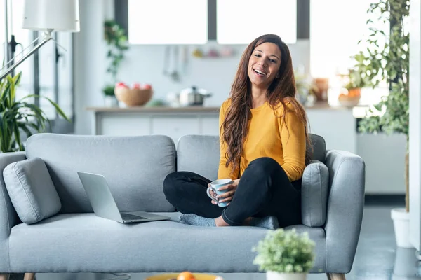 Shot Beautiful Young Woman Having Videocall Laptop While Drinking Cup — Stock Photo, Image