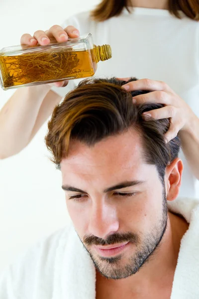 Masseur doing massage on man body in the spa salon. — Stock Photo, Image