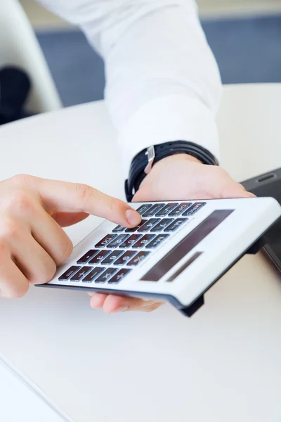 Young handsome man working in his office. — Stock Photo, Image