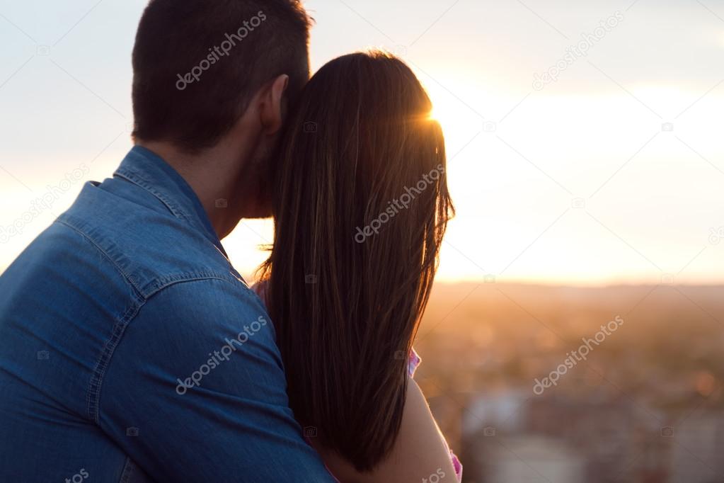 Young tourist couple looking at the views in the city.