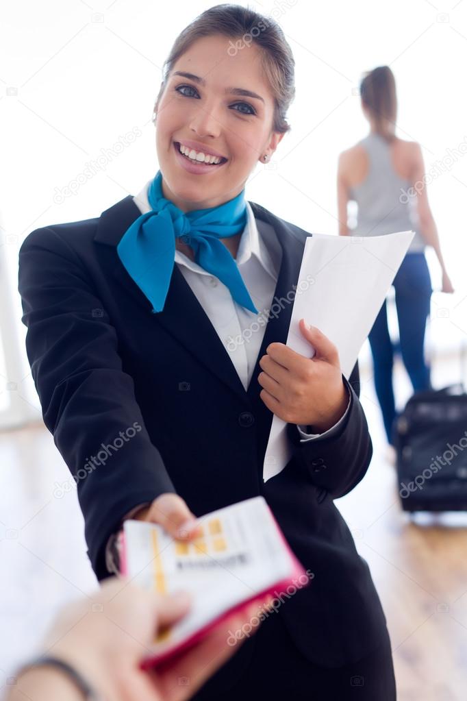 Beautiful hostess working in airport.