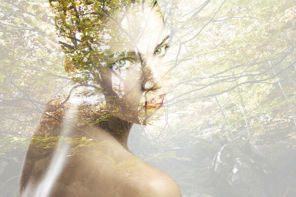 Double exposure of beautiful caucasian woman.