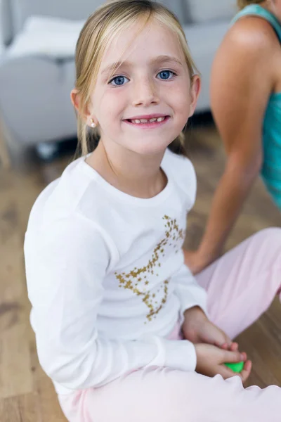 Beautiful child looking at camera at home. — Stock Photo, Image