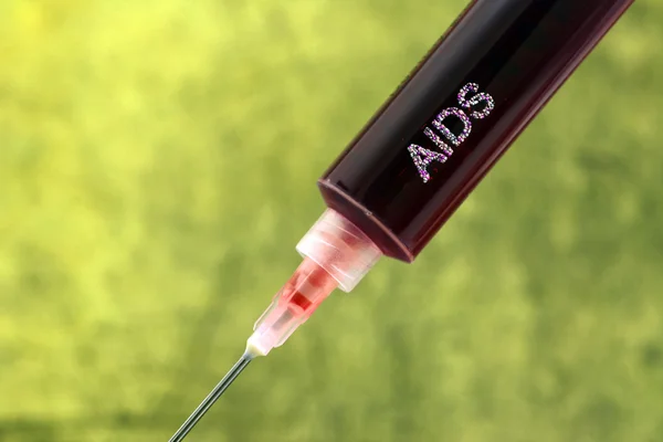 Aids no conceito de seringa — Fotografia de Stock