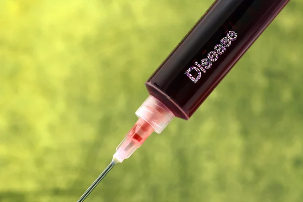 Doença no conceito de seringa — Fotografia de Stock