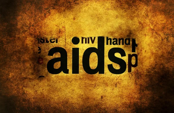 Grunge arka plan kavramı üzerinde AIDS metin — Stok fotoğraf