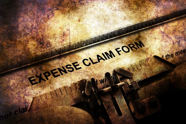 Expense claim form on vintage typewriter — Stock Photo, Image