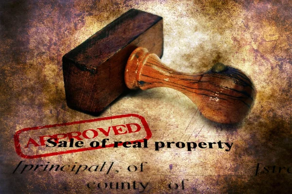 Stamp approved on sale of real property form — Stock Photo, Image