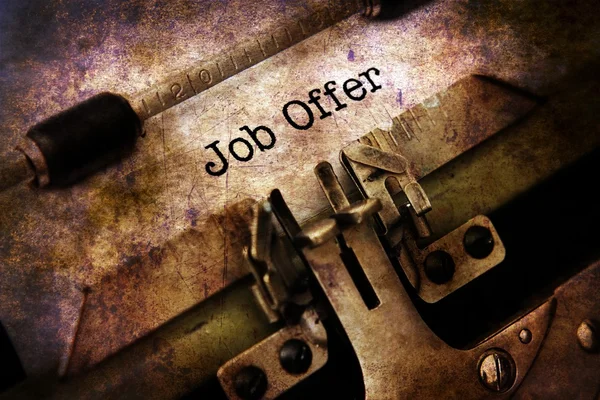 Job offer text on vintage typewriter — Stock Photo, Image