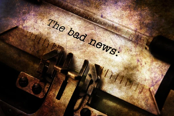 Bad news on typewriter grunge concept — Stock Photo, Image