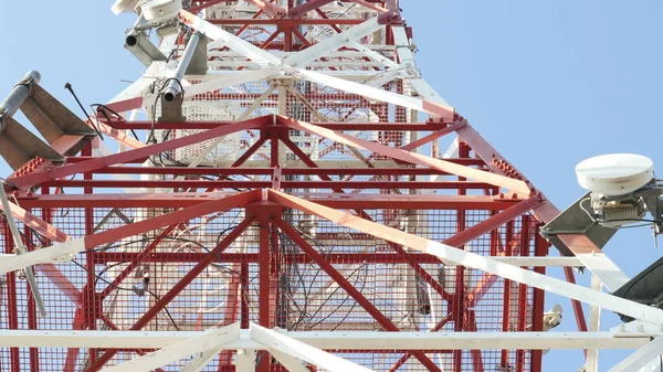 Telecommunication Cellular Tower Against Blue Sky