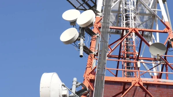 Telecommunication Cellular Tower Against Blue Sky