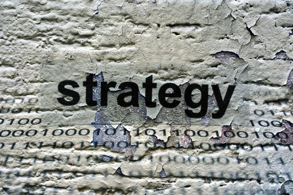 Strategy text on grunge background — Stock Photo, Image