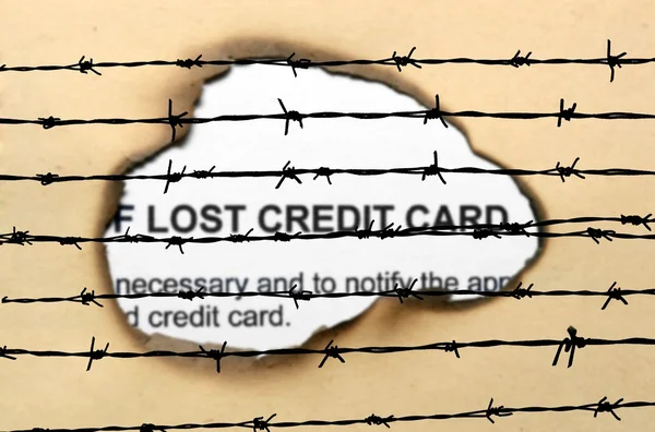 Lost credit card nad barbwire — Stock Photo, Image