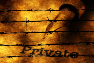 Fountain pen and private text against barbwire