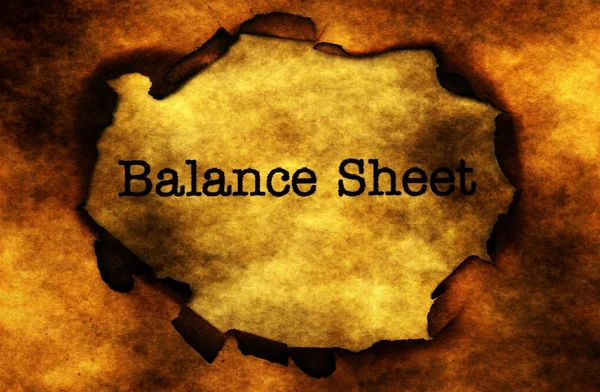 Balance sheet on grunge background — Stockfoto