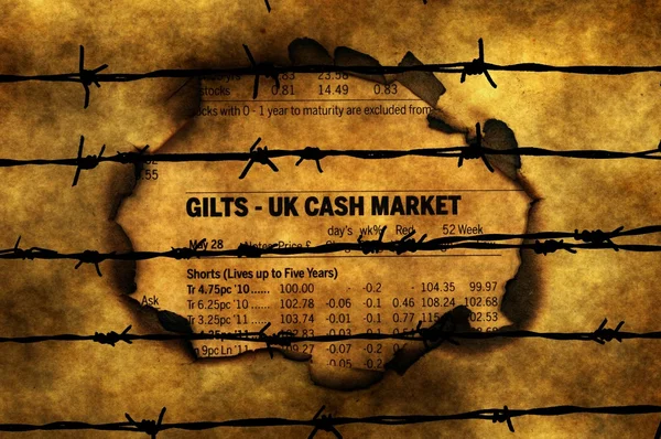 Reino Unido mercado de caixa contra barbwire — Fotografia de Stock