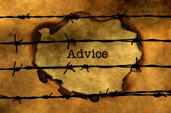 Advice concept against barbwire — Stock Photo, Image