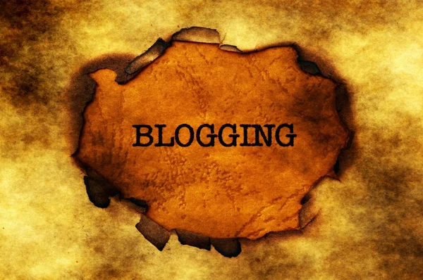 Blogging text on paper hole — Stock Photo, Image