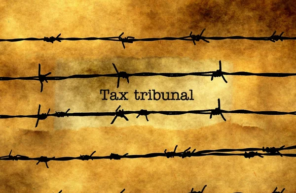 Tax tribunal text mot barbwire — Stockfoto