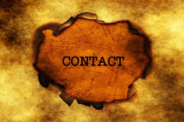 Contact text on paper hole — Stock Photo, Image