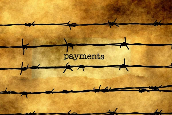 Payments text against barbwire — Stock Photo, Image