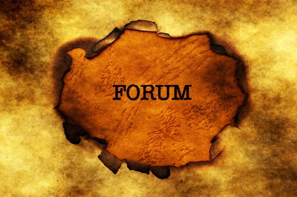 Forum text on grunge paper hole — Stock Photo, Image