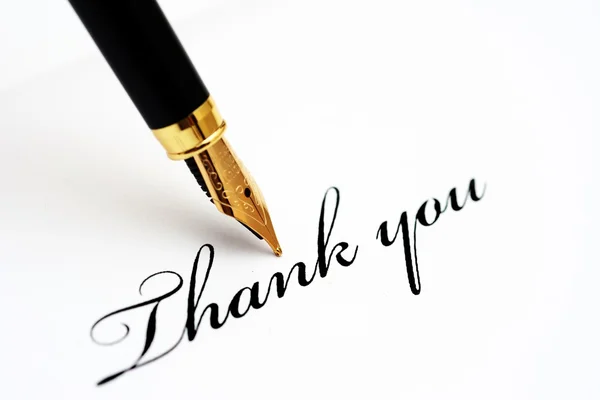 Fountain pen on thank you Stock Picture