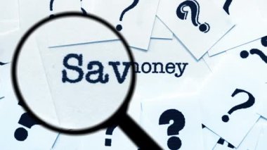 Soru İşaretleri ve Sözcükler Arasında Para Kaydetmek için Büyütme