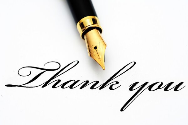 Fountain pen on thank you text