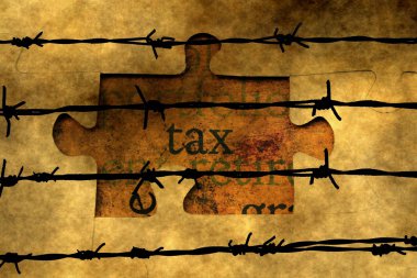 Tax puzzle concept against barbwire clipart