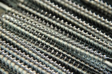 Endüstriyel arka plan olarak yeni vida